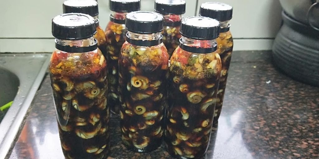 湯玉惠開發可延長保存期限的螺貝加工料理備受矚目。(圖/新北漁業處 提供)