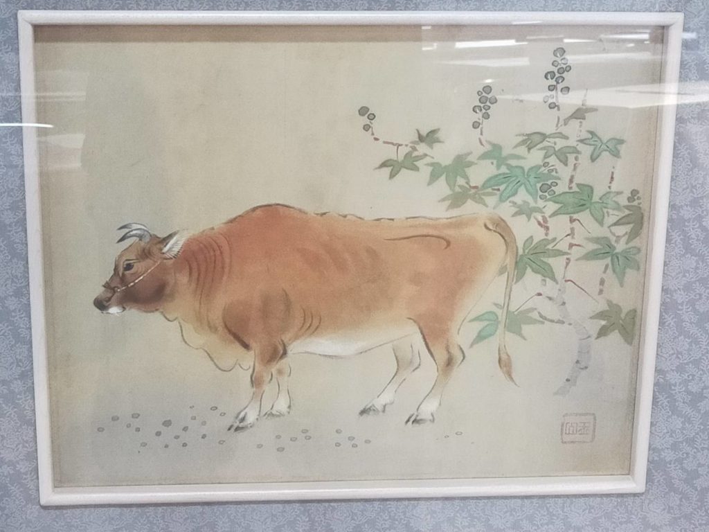 ▲林玉山年代久遠的作品「黃牛」,經過修復師的巧手而恢復其光彩面貌,也在這次畫作捐贈之列。(記者 辛澎祥/攝)