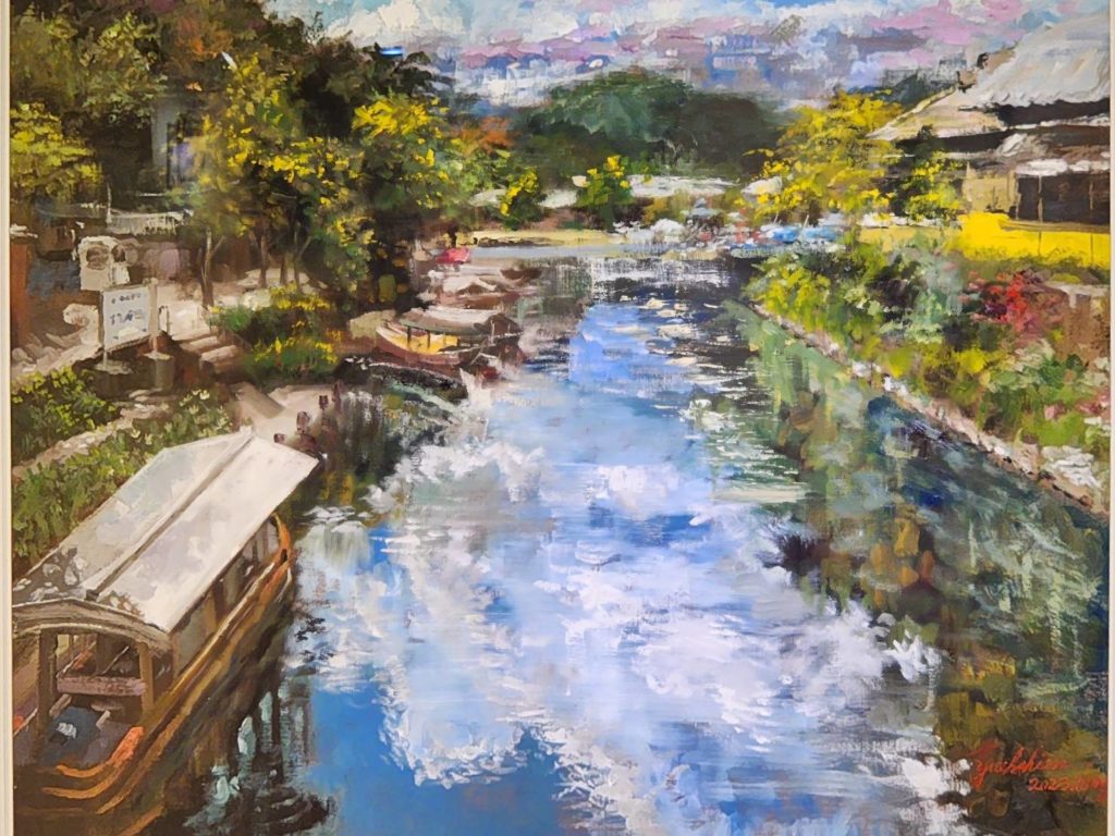 ▲蔣岳賢的畫作有著對景觀描繪的詩意，筆觸靈動充滿生命力。（圖/詹佳綺 攝）