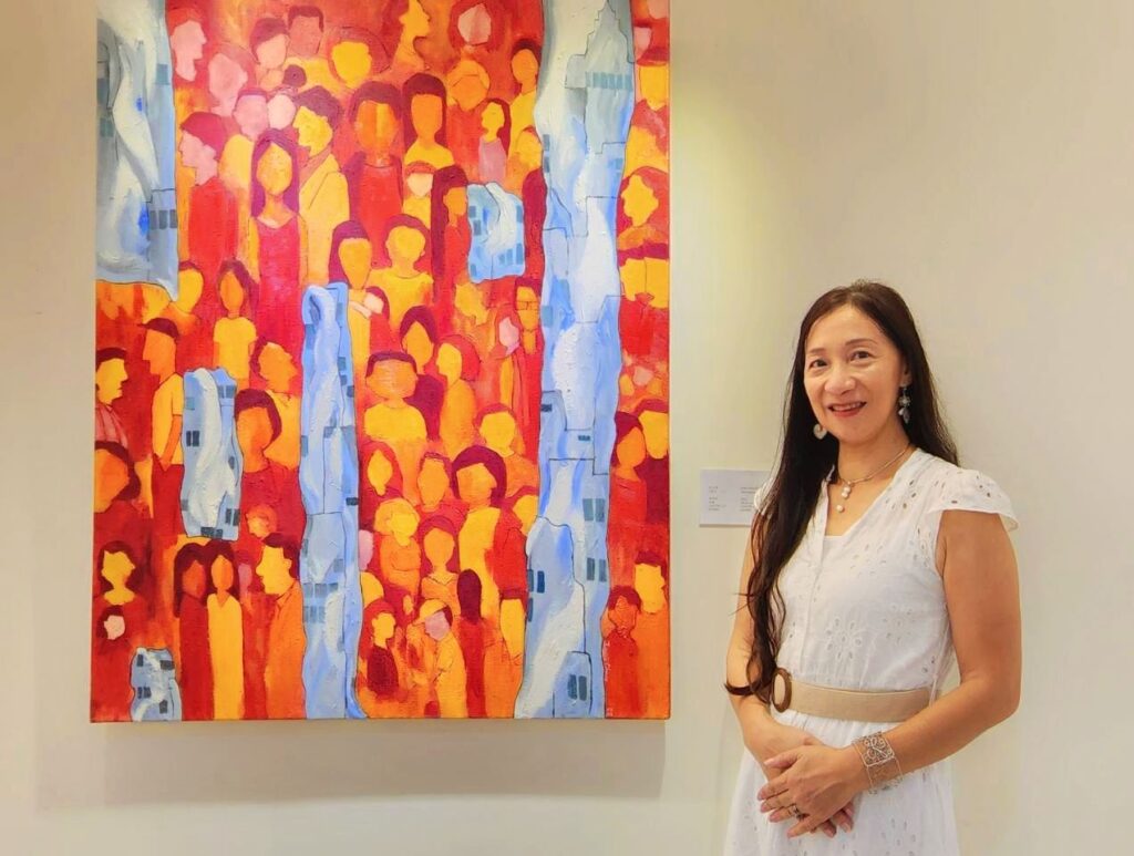 ▲莊欣婷在作品「都市•人」,在生硬無趣的建築大樓中看盡都會男女的心思瑕想。(記者 詹佳綺/攝)