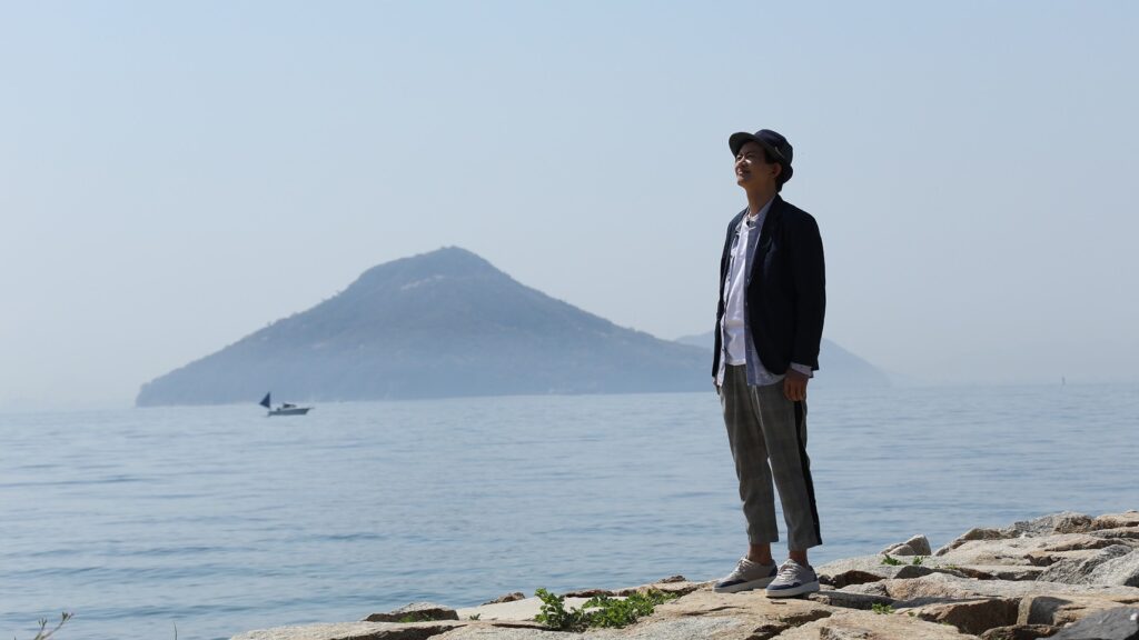 ▲項明生與豐島合影。(圖/亞洲旅遊台 提供)