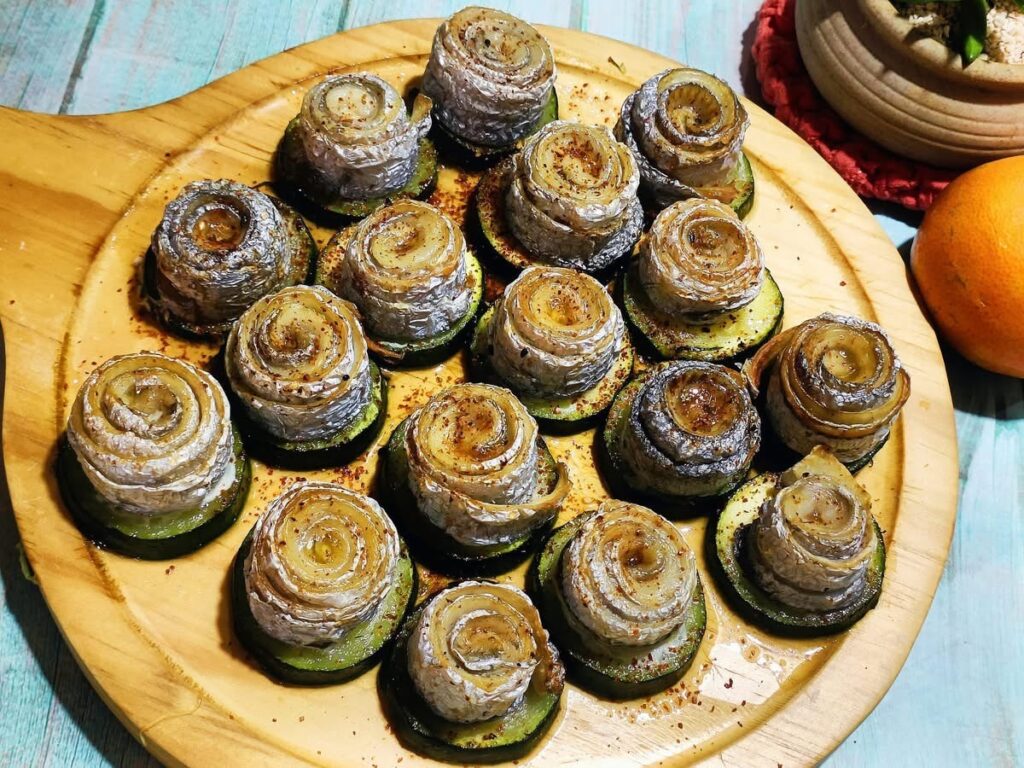 鹽烤白帶魚卷佐櫛瓜，營養又美味 。（圖/新北漁業處提供）