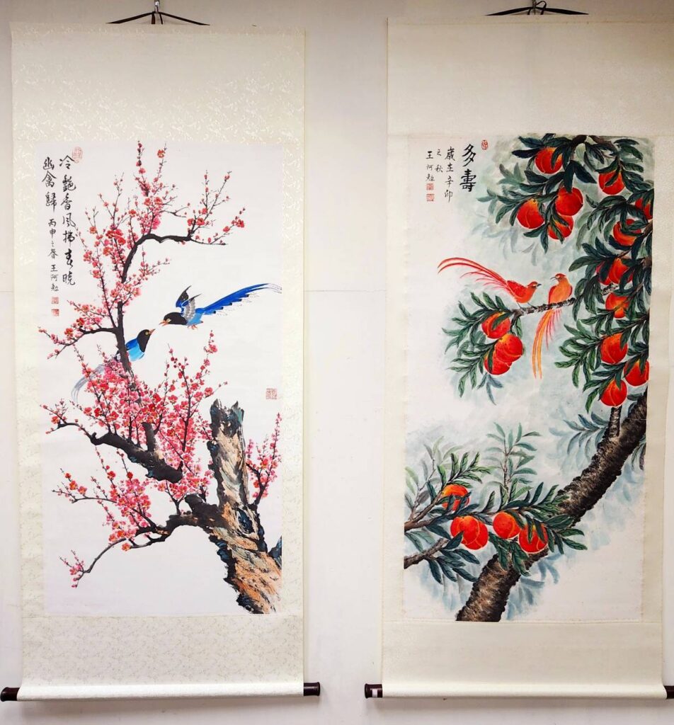 ▲花鳥的互動傳情，彰顯出王阿勉老師在工筆水墨功底的獨到之處。（記者 辛澎祥/攝）